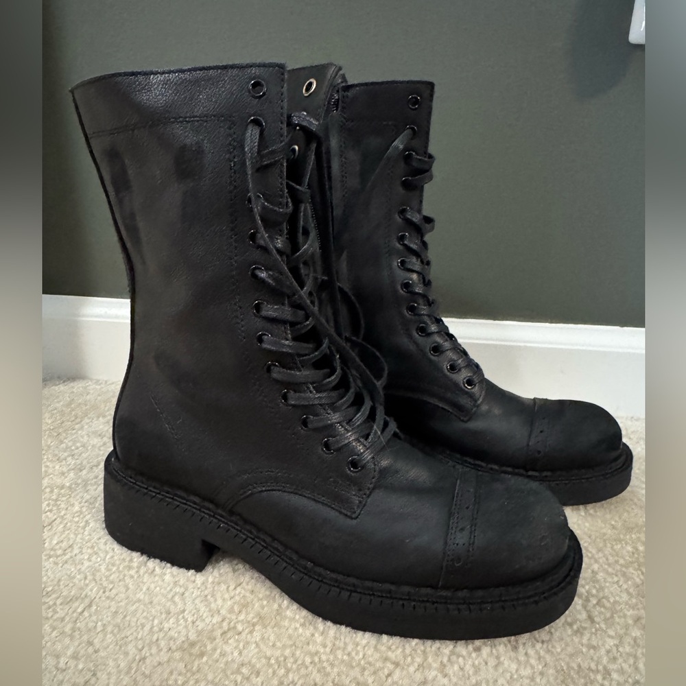Steve Madden Black Combat Boots with High-Top Design and Chunky Soles